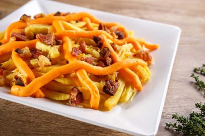 Batata frita com cheddar e bacon